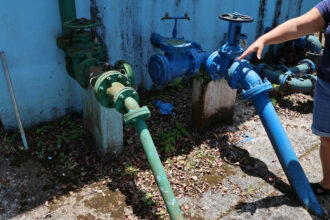 Water pipes lead to the Buenos Aires Community Aqueduct, a small system in Caguas, Puerto Rico. Credit: Sarah Mattalian