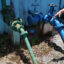 Water pipes lead to the Buenos Aires Community Aqueduct, a small system in Caguas, Puerto Rico. Credit: Sarah Mattalian