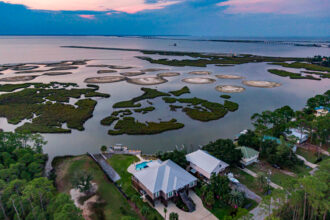 An aerial view of Dauphin Island’s shoreline and marsh mounds in Alabama. Credit: Lee Hedgepeth/Inside Climate News