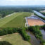 The covered coal ash pond at Alabama Power’s Plant Gadsden sits adjacent to the Coosa River in Gadsden, Ala. Credit: Courtesy of Coosa Riverkeeper