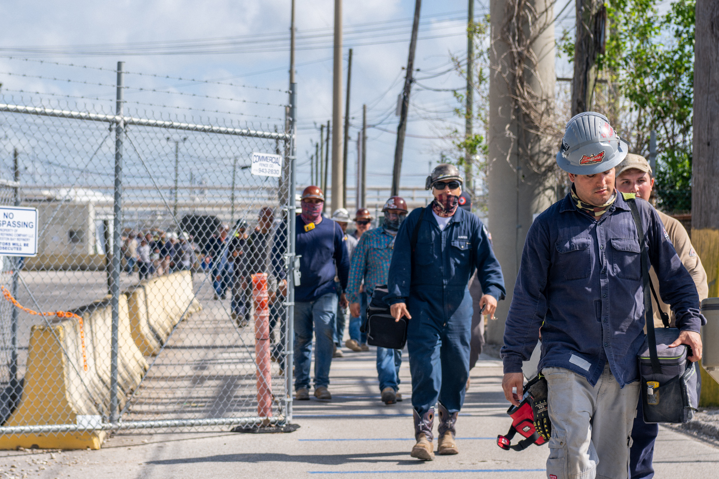 Workers exit the Marathon Galveston Bay Refinery on May 10, 2022, in Texas City, Texas. Credit: Brandon Bell/Getty Images