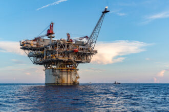 An offshore oil drilling rig is seen in the Gulf of Mexico. Credit: Ron Buskirk/UCG/Universal Images Group via Getty Images