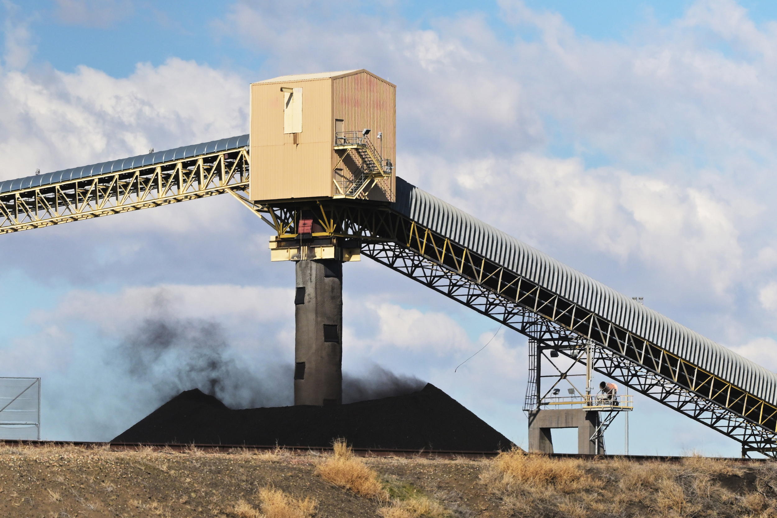 Strong winds carry coal dust from a coal pile at the Comanche Generating Station on Feb. 4 in Pueblo, Colo. Credit: RJ Sangosti/MediaNews Group/The Denver Post via Getty Images