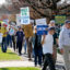 Demonstrators march during a “Hands off the EPA” rally on April 22 outside the agency’s offices in Ann Arbor, Mich. Credit: Jeff Kowalsky/AFP via Getty Images