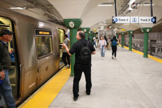 People exit a New Jersey Transit PATH train on May 19 in Hoboken, N.J. Credit: Michael M. Santiago/Getty Images