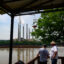 Trent Williams and his grandson, Nathan, look across the Ohio River at the Hugh L. Spurlock Generating Station on June 12 in Maysville, Ky. Credit: Jeff Swensen/Getty Images