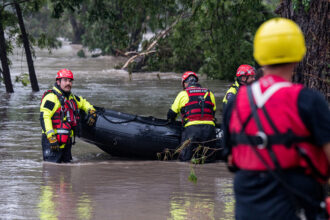 Boerne search and rescue team members prepare for operations on the flooded Guadalupe River on July 4 in Comfort, Texas. Credit: Eric Vryn/Getty Images