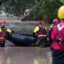 Boerne search and rescue team members prepare for operations on the flooded Guadalupe River on July 4 in Comfort, Texas. Credit: Eric Vryn/Getty Images