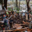 Search and rescue workers dig through debris after flash flooding on July 6 in Hunt, Texas. Credit: Jim Vondruska/Getty Images