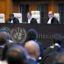 Yuji Iwasawa (center), president of the International Court of Justice, issues the first advisory opinion on States’ legal obligations to address climate change in The Hague on Wednesday. Credit: John Thys/AFP via Getty Images