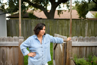 Traci Donatto outside her home in Deer Park, Texas. After 20 years away, she returned to the Houston suburb to care for her father, a former contract welder for the petrochemical industry who is dying of cancer. Credit: Mark Felix/Public Health Watch