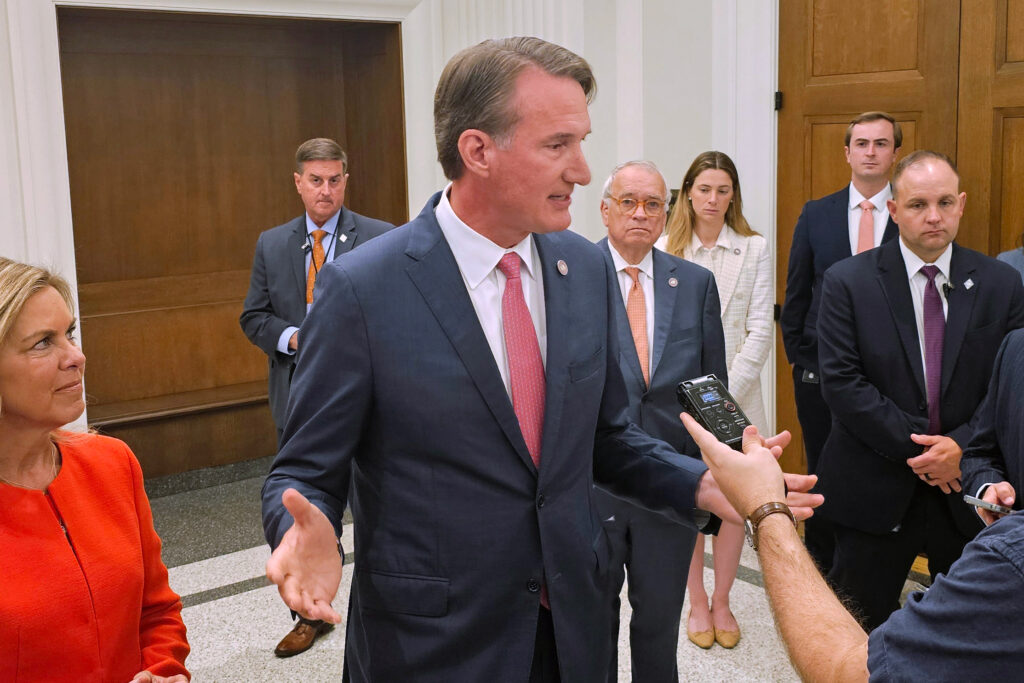 Gov. Glenn Youngkin takes questions from reporters on Thursday, Aug. 14. Credit: Charles Paullin/Inside Climate News