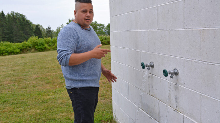 Billy Longfellow of the Sipayik Environmental Department explains how the Samaqannihkuk well station works. Credit: Sydney Cromwell/Inside Climate News