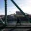 A pedestrian crosses the Grand Street Bridge over the heavily polluted Newtown Creek in New York City. Credit: Robert Nickelsberg/Getty Images