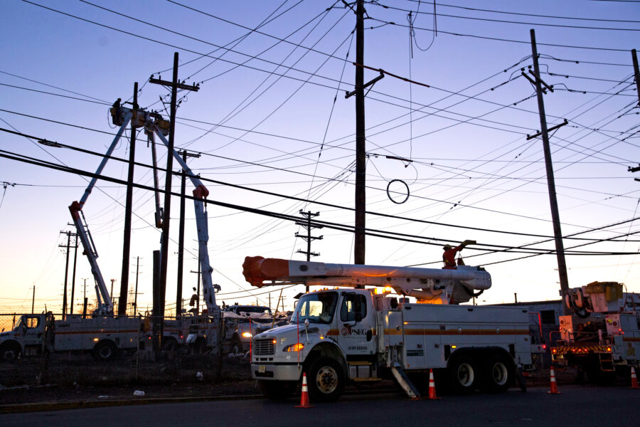 A crew with the Public Service Electric and Gas Company work on power lines in Ridgefield, N.J. Credit: EMAZ/VIEWpress