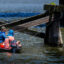 Two men fish in a small boat on a tributary of the Chesapeake Bay in Chester, Md., on May 30, 2024. Credit: Jim Watson/AFP via Getty Images