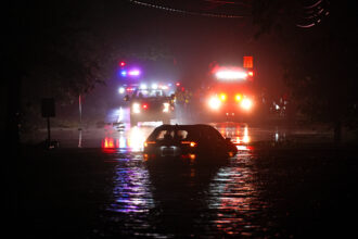 A street floods in Plainfield, N.J., as Gov. Phil Murphy declares a state of emergency during heavy rainfall on July 15. Credit: Lokman Vural Elibol/Anadolu via Getty Images