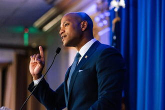 Gov. Wes Moore speaks to a crowd of supporters at the Maryland Democratic Party annual gala in Baltimore June 12. Credit: Wesley Lapointe/The Washington Post via Getty Images