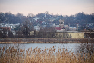 The Des Moines River flows through downtown Ottumwa, Iowa. Credit: Matt McClain/The Washington Post via Getty Images