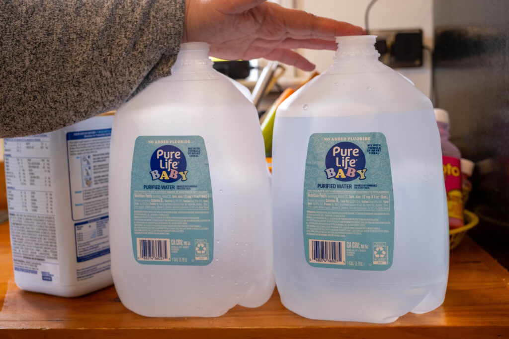 Gina Ramirez doesn’t qualify for Chicago’s subsidized service line replacement program, but she can’t afford to make the change on her own. For now, she and her family rely on filtering and buying bottled water. Credit: Keerti Gopal/Inside Climate News