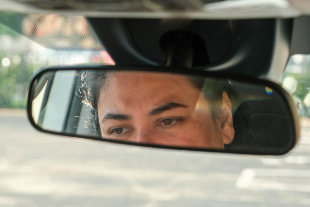 Most days, Gina Ramirez hands her 11-year-old son a plastic water bottle in the car because she doesn’t trust the water coming out of her tap at home. Credit: Keerti Gopal/Inside Climate News