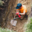 A worker replaces a main water lead pipe at a home in Chicago’s West Ridge neighborhood on July 25. Credit: Anthony Vazquez/Sun-Times