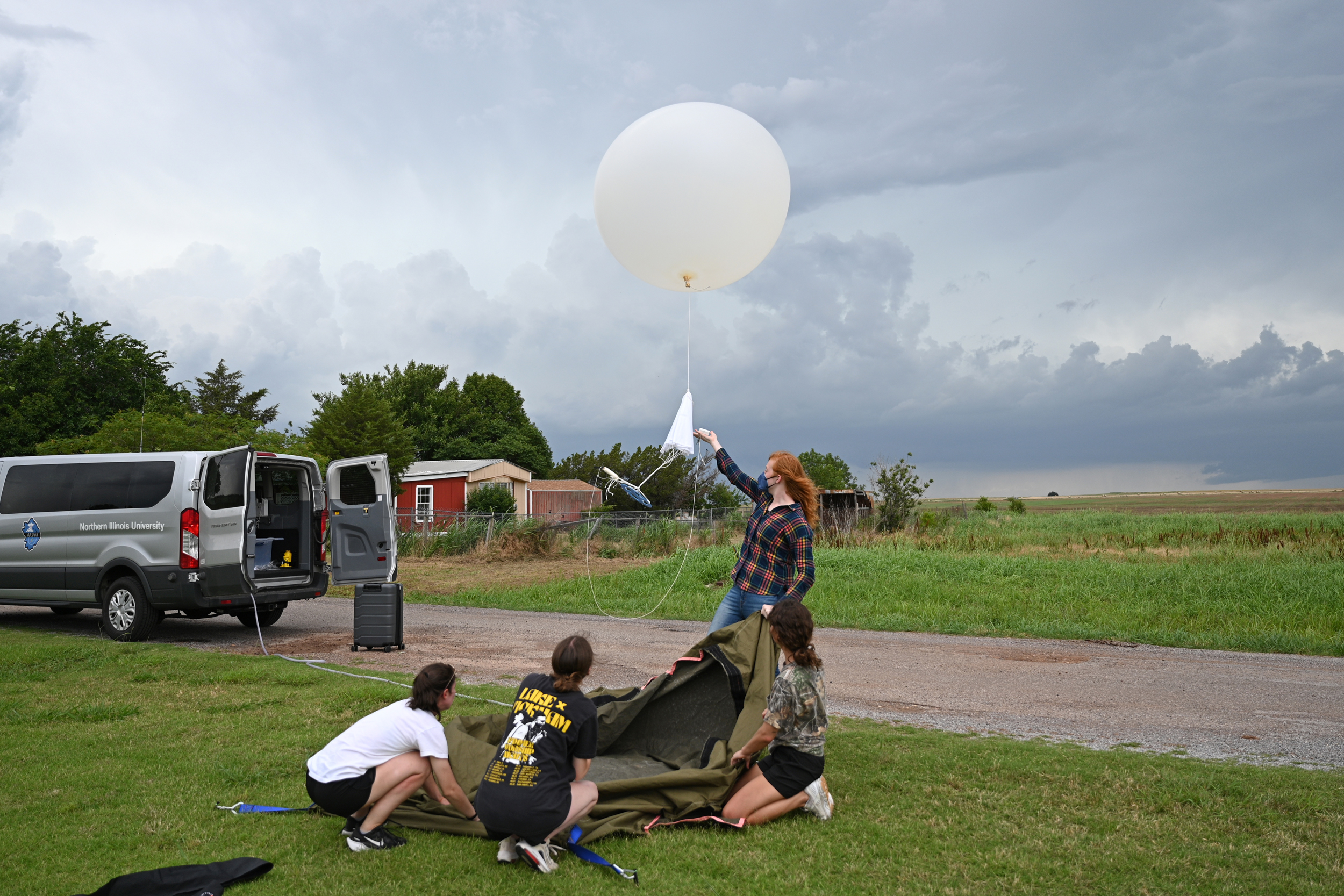 Students from Northern Illinois University prepare to launch a weather balloon to capture data on temperature, humidity, wind speed and direction. Credit: National Science Foundation ICECHIP