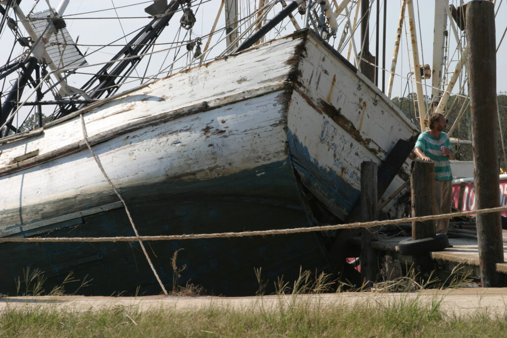 Shrimp boats docked in Bayou La Batre during Hurricane Katrina faced a torrent of wind and rain as well as a storm surge of around 14 feet. Many of the boats in the bayous of south Mobile County were a total loss. Credit: Courtesy of Chris Taylor