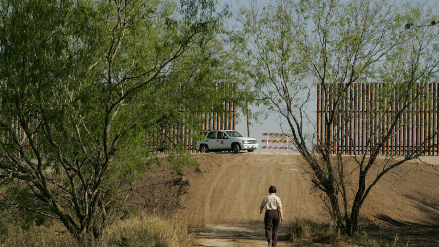 The border wall is seen in the Lower Rio Grande Valley National Wildlife Refuge. Credit: Steve Hillebrand/USFWS