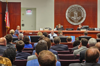 Ed Baine, president of Dominion Energy Virginia, takes questions during the utility’s rate case hearing on Wednesday. Credit: Charles Paullin/Inside Climate News