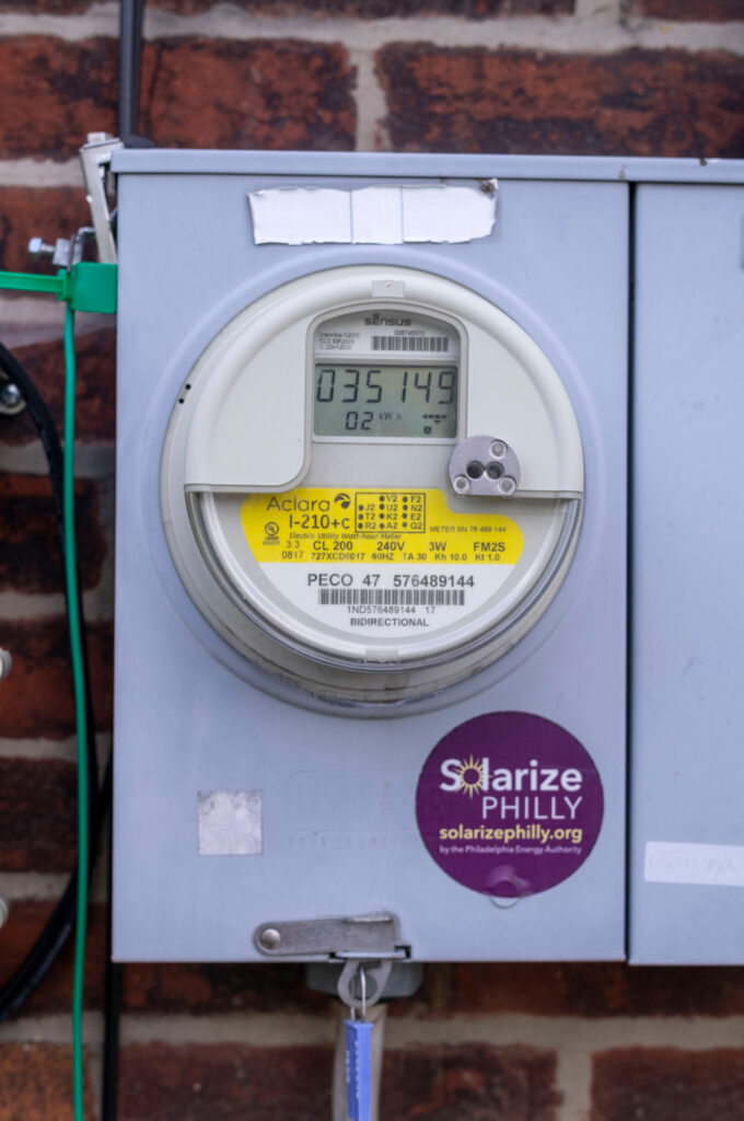 The electric meter at Liz Robinson’s rental property in Philadelphia. Credit: Laurence Kesterson/Inside Climate News
