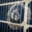 This solar panel has been struck by an ice ball during a durability test at the Renewable Energy Test Center in Fremont, Calif. Credit: RETC