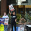 Sandy Bahr (center), the Sierra Club’s Grand Canyon chapter director, speaks during a protest on Thursday over Arizona Power Service’s recent decision to walk back its clean energy goals. Credit: Wyatt Myskow/Inside Climate News