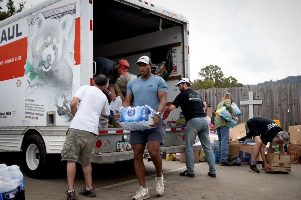 Volunteers unload emergency supplies at a distribution site run by the Swannanoa First Baptist Church on Oct. 4, 2024. Credit: Marvin Joseph/The Washington Post via Getty Images/Grist