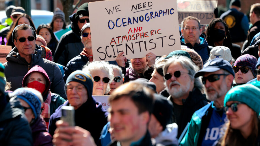 Demonstrators gather to protest against federal cuts to scientific research outside the headquarters of NOAA on March 3 in Silver Spring, Md. Credit: Chip Somodevilla/Getty Images