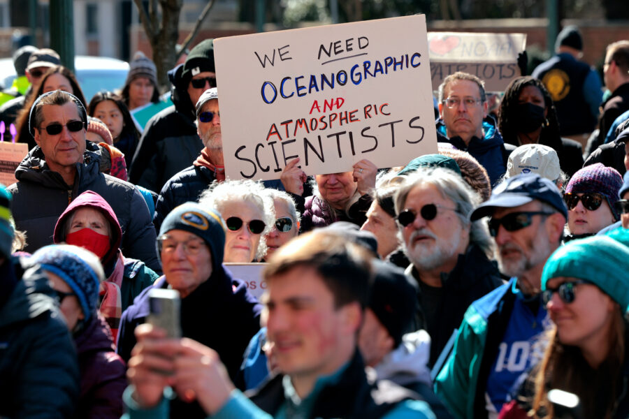 Demonstrators gather to protest against federal cuts to scientific research outside the headquarters of NOAA on March 3 in Silver Spring, Md. Credit: Chip Somodevilla/Getty Images