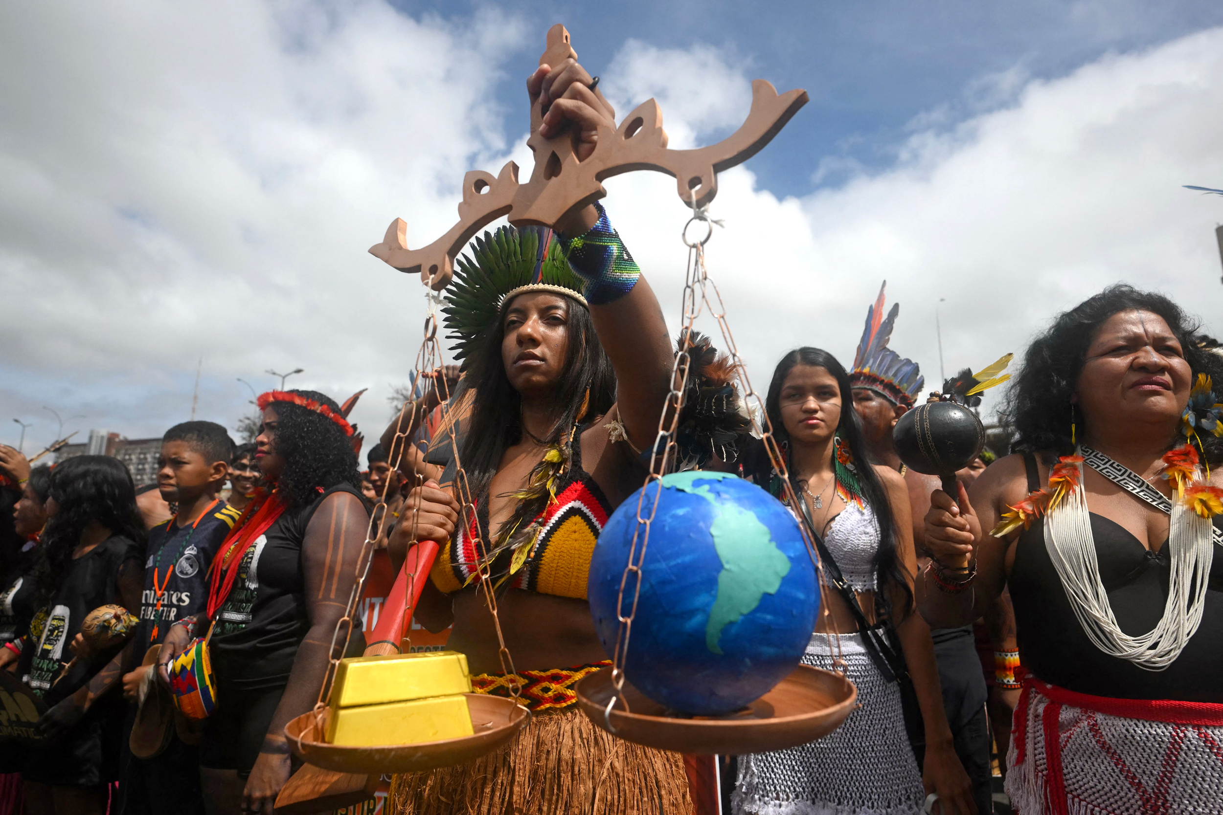 Pataxó people take part in the “Our future is not for sale” march within the Free Land Camp in Brazil on April 8. Credit: Mauro Pimentel/AFP via Getty Images