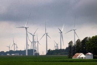 Wind turbines tower over a rural landscape on July 5 near Pomeroy, Iowa. Credit: Scott Olson/Getty Images