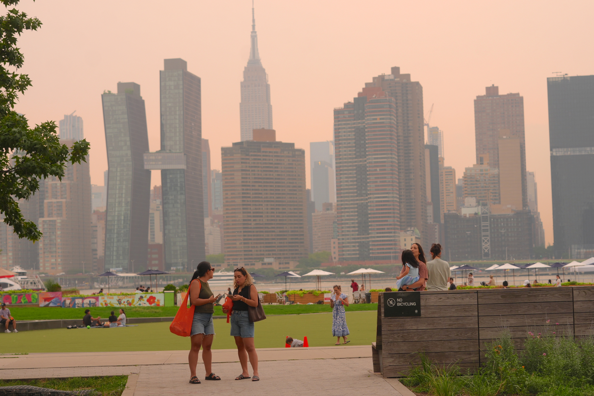 A thick haze blankets New York City as smoke from Canadian wildfires impacts air quality on August 5. Credit: Selcuk Acar/Anadolu via Getty Images