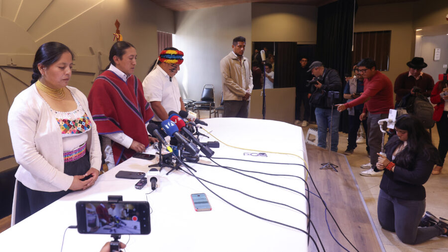 Members of CONAIE observe a moment of silence honoring Efraín Fueres on Monday in Quito, Ecuador. Credit: Franklin Jacome/Agencia Press South via Getty Images