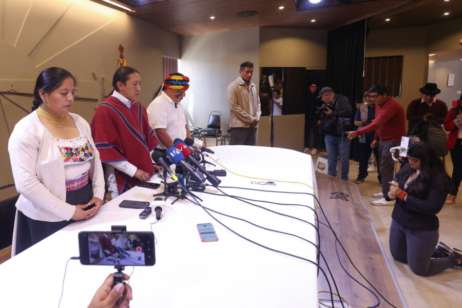 Members of CONAIE observe a moment of silence honoring Efraín Fueres on Monday in Quito, Ecuador. Credit: Franklin Jacome/Agencia Press South via Getty Images