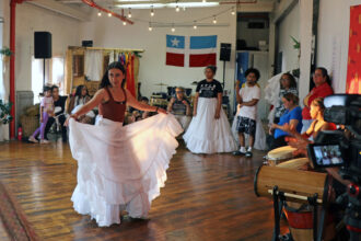 A dancer practices Bomba, a traditional Puerto Rican dance, at El Batey Puerto Rican Center on July 31 in Buffalo, N.Y. El Batey has a thriving bomba community. Credit: Finya Swai