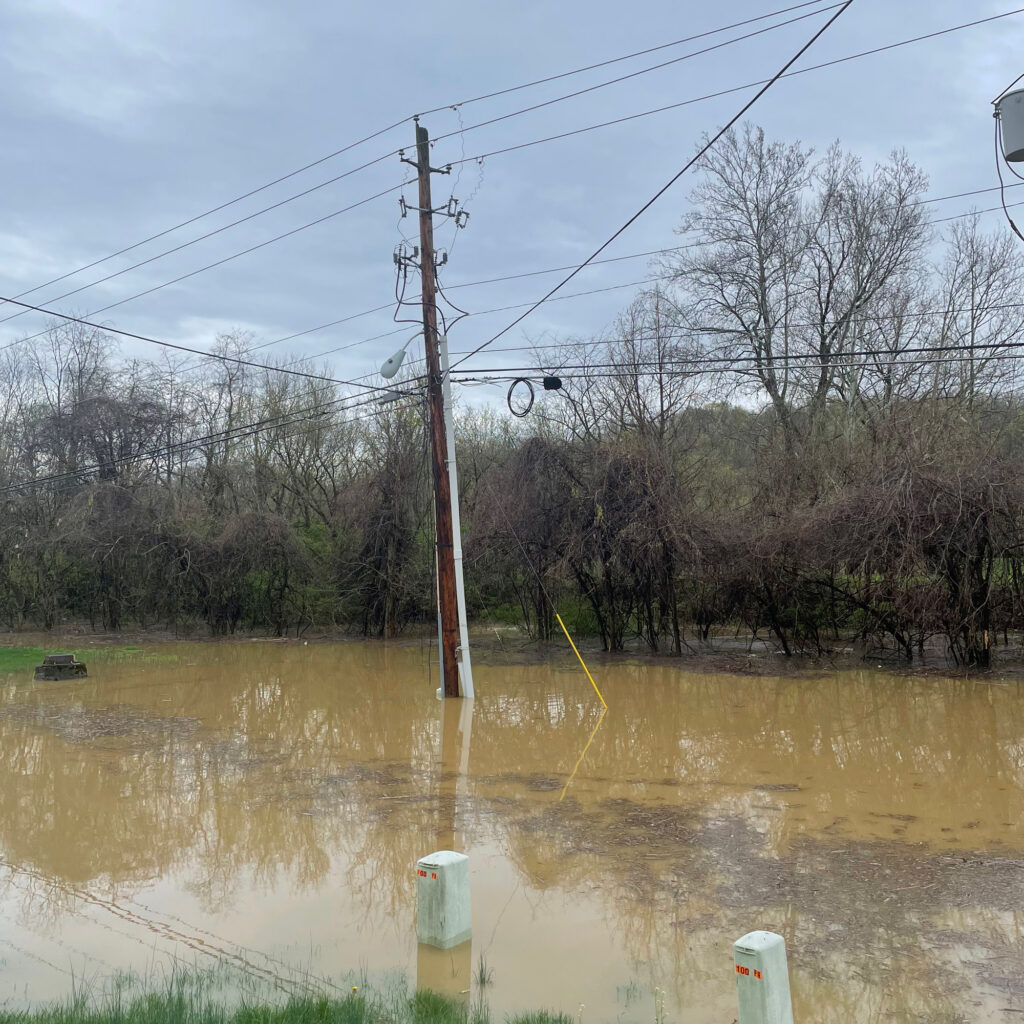 Floodwater overtakes a telephone pole in rural Athens County, Ohio. Credit: Athens County Regional Planning Commission