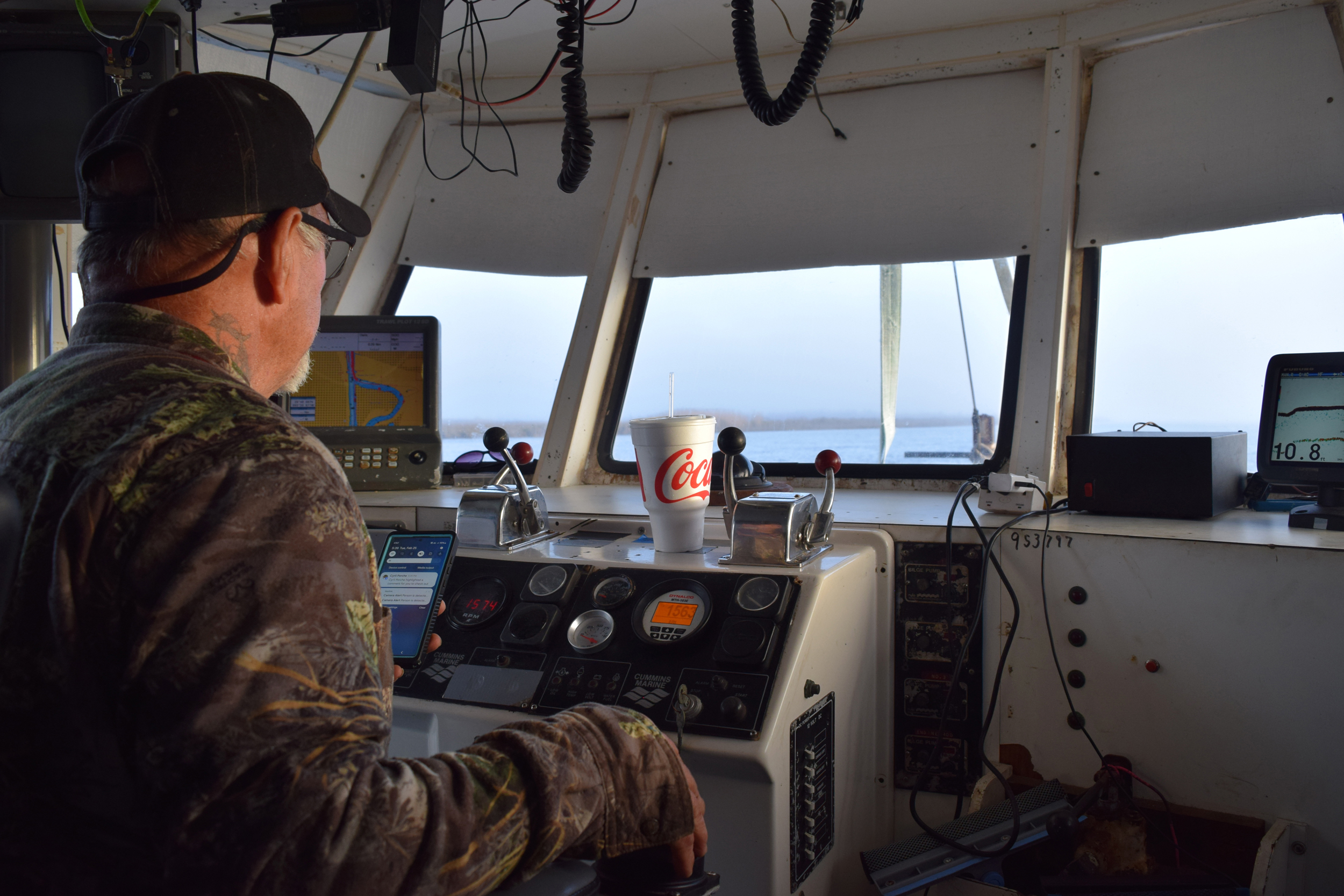 Ray Mallet and his boat, Cajun Memories, on the Calcasieu River near Cameron, La. Credit: Phil McKenna/Inside Climate News