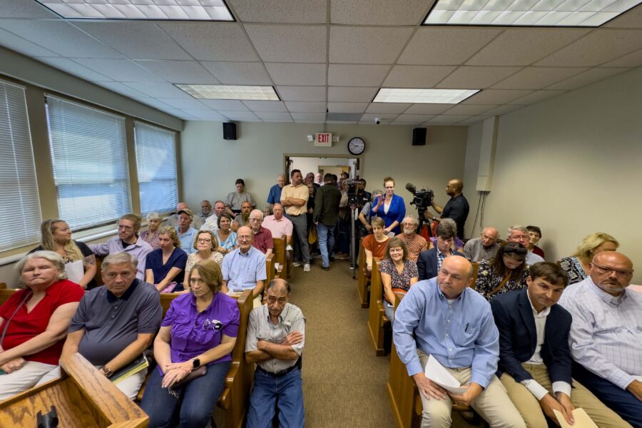 Dozens of residents filled the Blount County Commission's boardroom well over capacity on Thursday to oppose the approval of a medical waste treatment facility in Remlap, Alabama. Community members lined the halls outside the meeting. Credit: Lee Hedgepeth/Inside Climate News