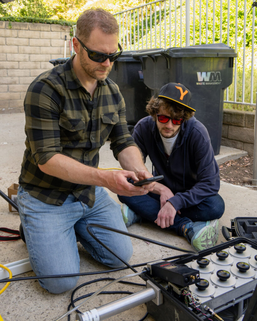 Nicholas Spada sets up the DRUM sampler at a residence in Los Angeles on June 13.