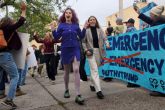 Olivia Vesovitch (center), Georgi Fischer (right) and Eva Lighthiser (back) arrive at the U.S. District Court of Montana in Missoula on Sept. 16. Credit: Elisabeth Kwak-Hefferan