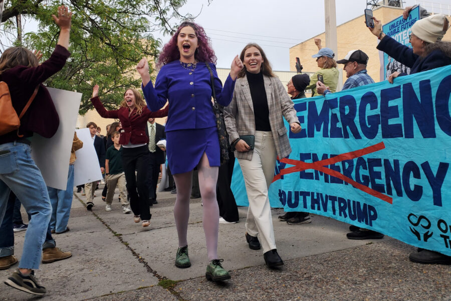 Olivia Vesovitch (center), Georgi Fischer (right) and Eva Lighthiser (back) arrive at the U.S. District Court of Montana in Missoula on Sept. 16. Credit: Elisabeth Kwak-Hefferan