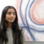 Mira Shah, who recently started a student-run climate economics journal, at her father’s office in Dublin, Calif. Credit: Liza Gross/Inside Climate News