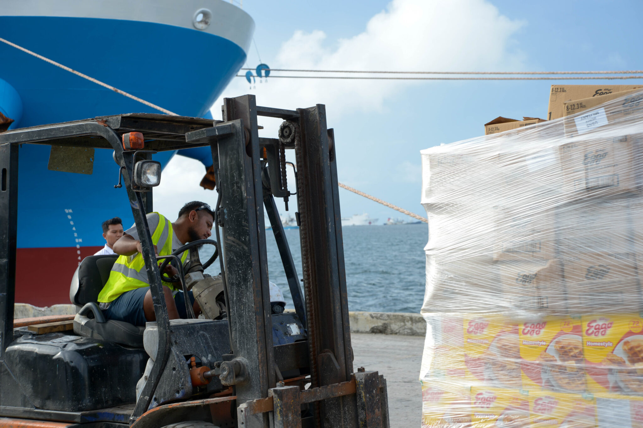 Shipments of food are sent throughout the islands from the country’s main port, Majuro. The nation relies on imports for more than 90% of its food. Credit: U.S. Navy